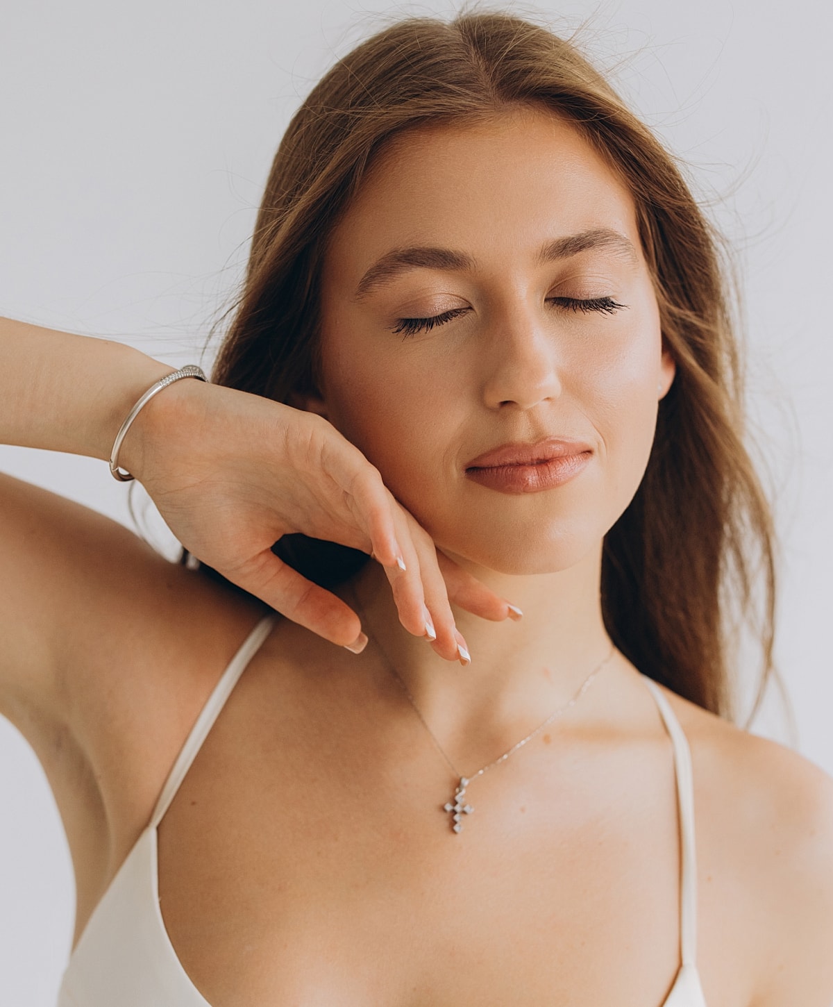Woman enjoying a moment of serenity and beauty.
