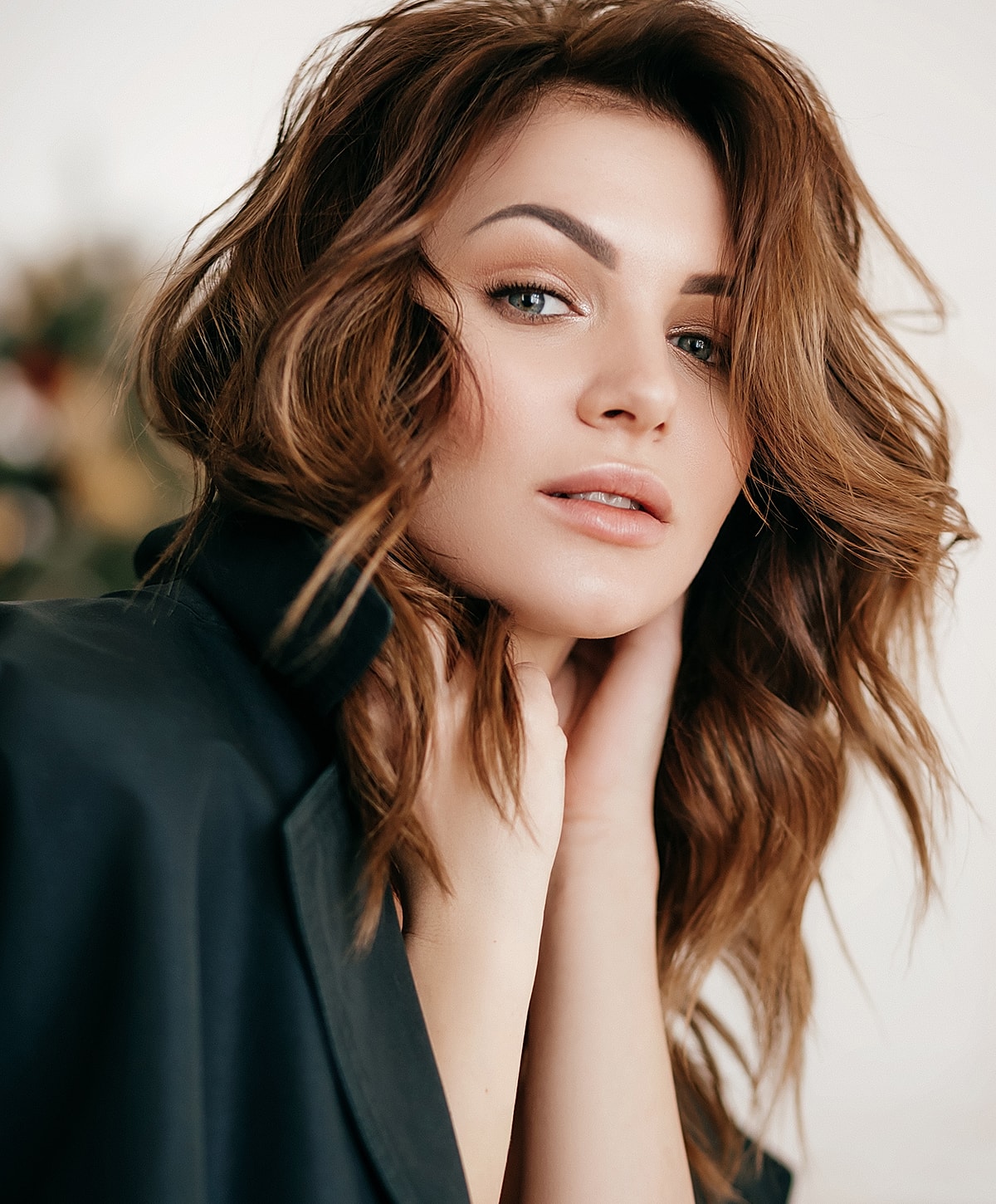 Client receiving facial treatment at beauty clinic.