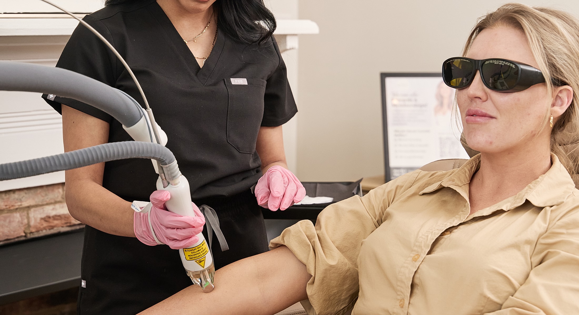 Laser hair removal treatment in a clinic setting.